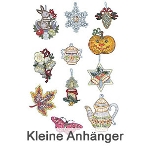 Kleine Anhänger aus Plauener Spitze auf weißem Hintergrund