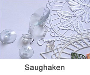 Saughaken auf weißem Hintergrund auf Plauener Spitze